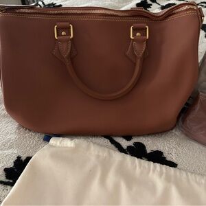 Sophisticated Tan Leather Satchel purchased from Nordstrom Rack. Includes strap.